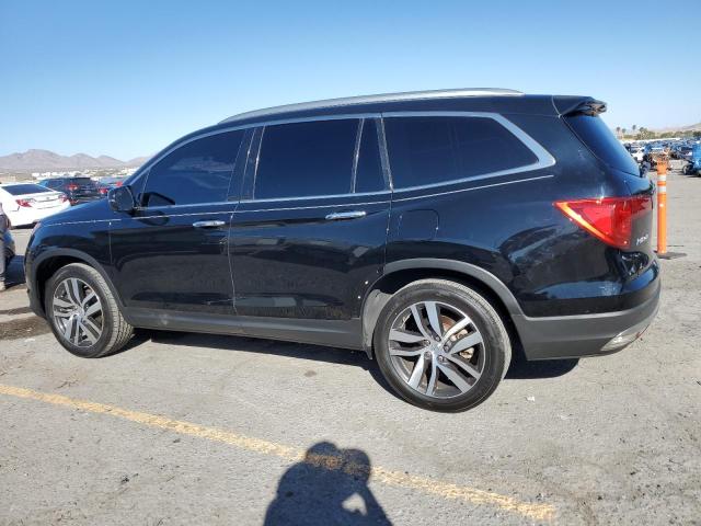 Photo 2 from auction – 2018 HONDA PILOT TOUR with VIN 5FNYF5H95JB017056