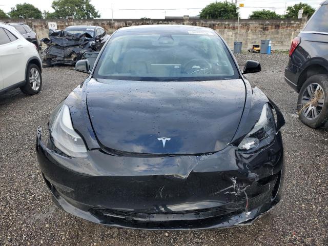 Photo 5 from auction – 2023 TESLA MODEL 3 with VIN 5YJ3E1EA5PF450714