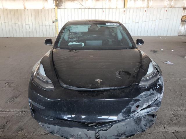 Photo 5 from auction – 2020 TESLA MODEL 3 with VIN 5YJ3E1EA9LF630112