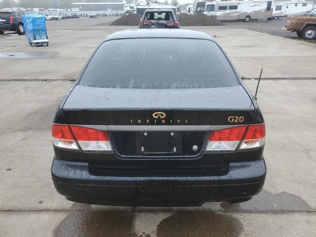 Photo 6 from auction – 2002 INFINITI G20 with VIN JNKCP11A72T508746