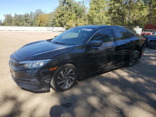 HONDA CIVIC EX 2016 with VIN 2HGFC2F71GH038068 - Photo from auction