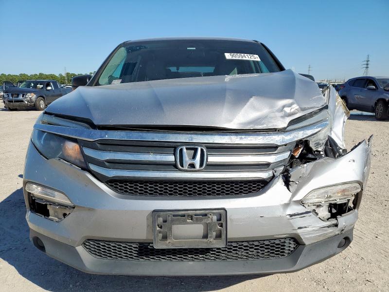 Photo 5 from auction – 2016 HONDA PILOT LX with VIN 5FNYF6H11GB077697