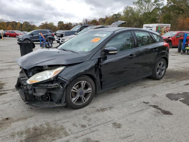 FORD FOCUS SE 2014 with VIN 1FADP3K22EL347273 - Photo from auction