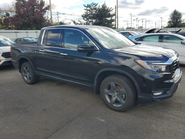 Photo 4 from auction – 2022 HONDA RIDGELINE with VIN 5FPYK3F70NB032305