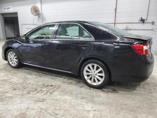 Photo 2 from auction – 2012 TOYOTA CAMRY HYBR with VIN 4T1BD1FKXCU048450