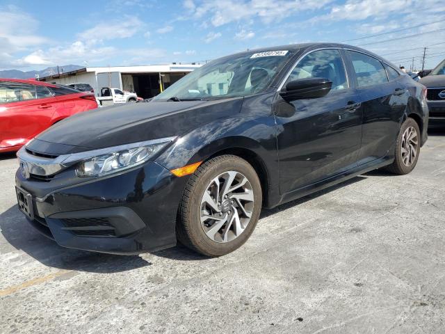 HONDA CIVIC EX 2018 with VIN 2HGFC2F77JH583943 - Photo from auction