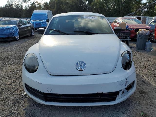 Photo 5 from auction – 2014 VOLKSWAGEN BEETLE with VIN 3VWFP7AT7EM627223