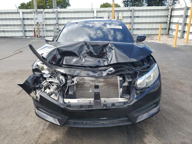 Photo 5 from auction – 2018 HONDA CIVIC with VIN 2HGFC4B01JH303616