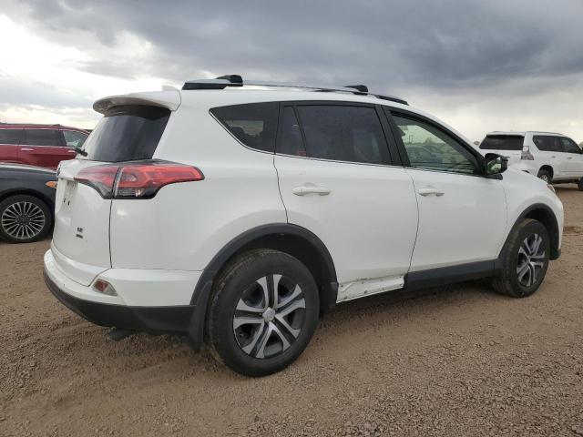 Photo 3 from auction – 2018 TOYOTA RAV4 LE with VIN JTMBFREV2JJ192615