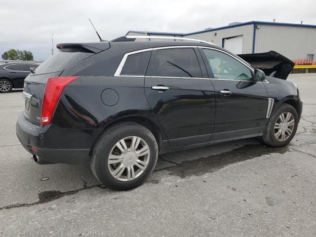 Photo 3 from auction – 2014 CADILLAC SRX LUXURY with VIN 3GYFNEE3XES670211