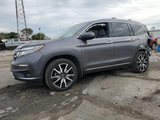HONDA PILOT TOUR 2021 with VIN 5FNYF6H94MB078697 - Photo from auction