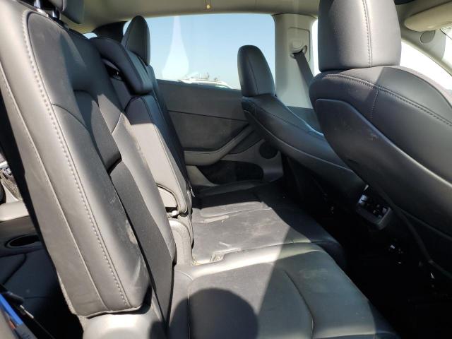 Photo 11 from auction – 2023 TESLA MODEL Y with VIN 7SAYGAEE1PF960967