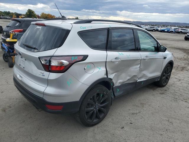 Photo 3 from auction – 2018 FORD ESCAPE SE with VIN 1FMCU9GD0JUD13327