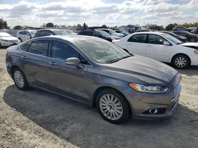 Photo 4 from auction – 2013 FORD FUSION TITANIUM PHEV with VIN 3FA6P0SU7DR373750