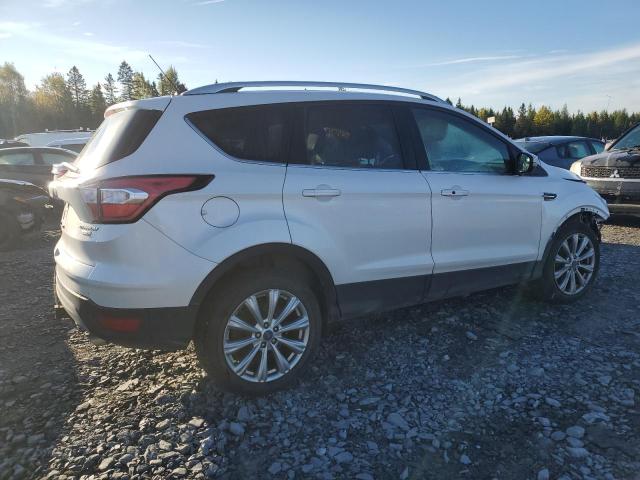 Photo 3 from auction – 2018 FORD ESCAPE TIT with VIN 1FMCU9J95JUC21344