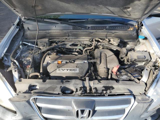 Photo 12 from auction – 2005 HONDA CR-V LX with VIN JHLRD68545C002065