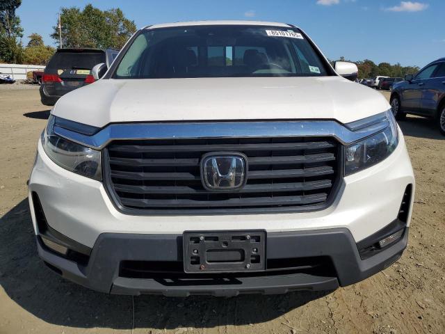 Photo 5 from auction – 2023 HONDA RIDGELINE with VIN 5FPYK3F59PB068110