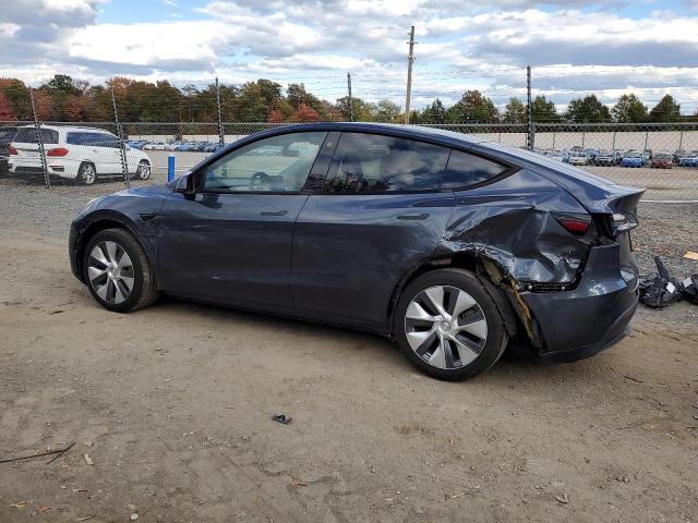 Photo 2 from auction – 2023 TESLA MODEL Y with VIN 7SAYGDEE9PA045993