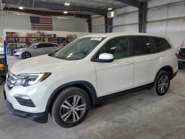 HONDA PILOT EXL 2018 with VIN 5FNYF6H56JB000897 - Photo from auction