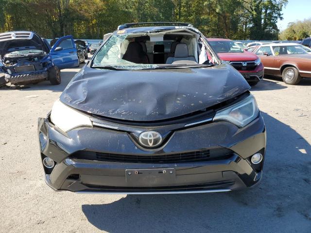 Photo 5 from auction – 2017 TOYOTA RAV4 XLE with VIN 2T3RFREV2HW614263