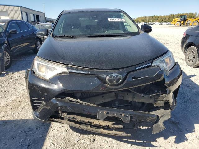 Photo 5 from auction – 2018 TOYOTA RAV4 LE with VIN 2T3BFREV7JW755191