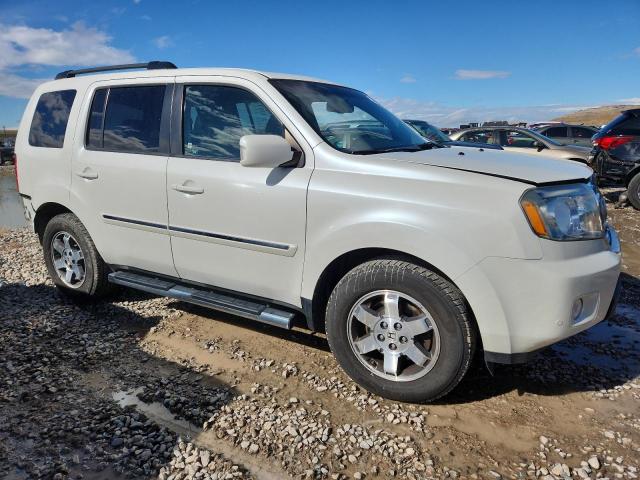 Photo 4 from auction – 2011 HONDA PILOT TOURING with VIN 5FNYF4H92BB505571