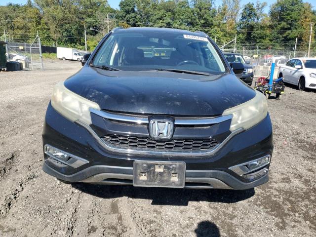 Photo 5 from auction – 2015 HONDA CR-V with VIN 2HKRM4H73FH620678