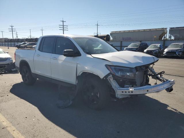 Photo 4 from auction – 2024 HONDA RIDGELINE with VIN 5FPYK3F82RB026617