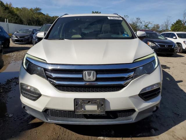 Photo 5 from auction – 2017 HONDA PILOT TOUR with VIN 5FNYF6H90HB105142