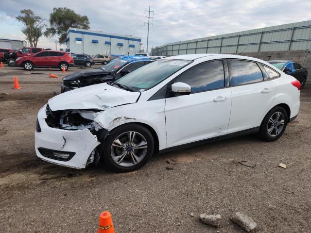 FORD FOCUS SE 2017 with VIN 1FADP3FE3HL329213 - Photo from auction