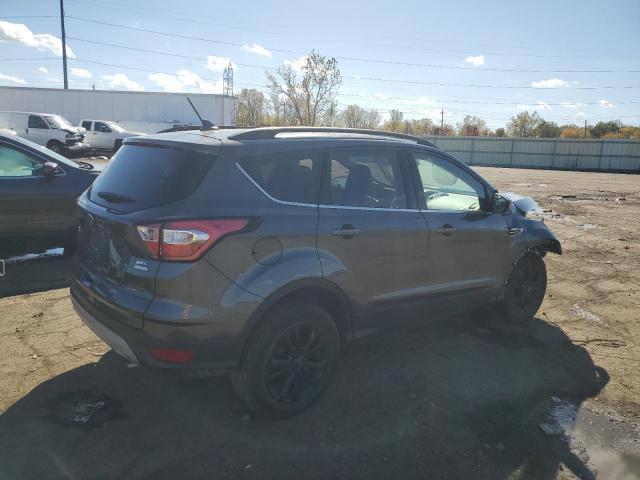 Photo 3 from auction – 2018 FORD ESCAPE SEL with VIN 1FMCU0HD7JUA70609