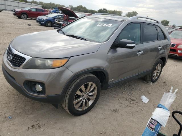 KIA SORENTO EX 2011 with VIN 5XYKUDA2XBG040734 - Photo from auction
