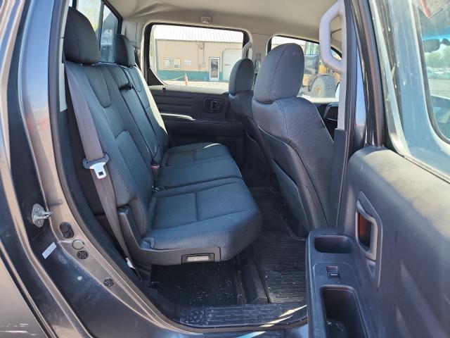 Photo 10 from auction – 2010 HONDA RIDGELINE with VIN 5FPYK1F28AB012385