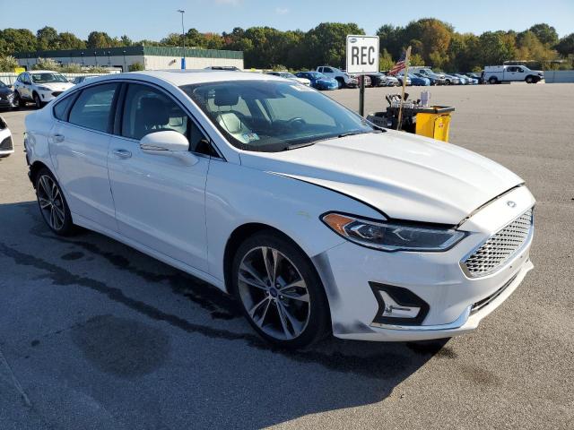 Photo 4 from auction – 2019 FORD FUSION TIT with VIN 3FA6P0D98KR184482
