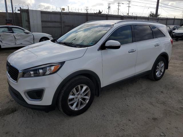 KIA SORENTO LX 2018 with VIN 5XYPG4A35JG409441 - Photo from auction