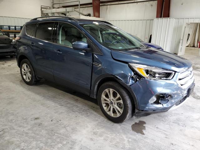 Photo 4 from auction – 2018 FORD ESCAPE SE with VIN 1FMCU9GD5JUB18906