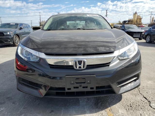 Photo 5 from auction – 2018 HONDA CIVIC EX with VIN 2HGFC2F77JH583943