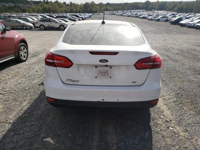 Photo 6 from auction – 2018 FORD FOCUS SE with VIN 1FADP3F21JL319761