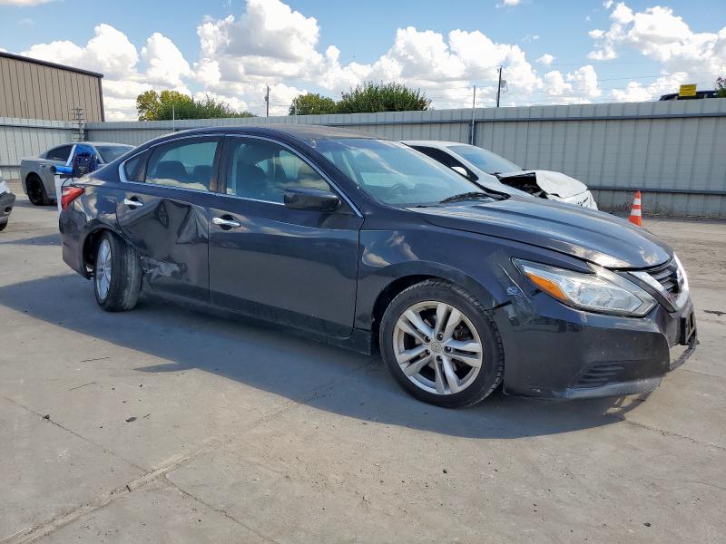 Photo 4 from auction – 2016 NISSAN ALTIMA 2.5 with VIN 1N4AL3AP7GC201854