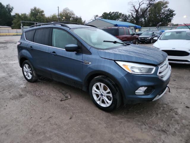 Photo 4 from auction – 2018 FORD ESCAPE SE with VIN 1FMCU9GD6JUA93269