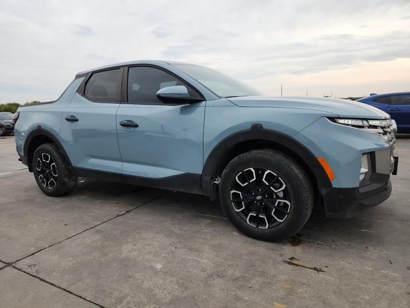 Photo 4 from auction – 2023 HYUNDAI SANTA CRUZ with VIN 5NTJBDAE3PH066962
