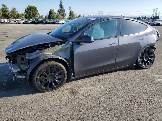 TESLA MODEL Y 2023 with VIN 7SAYGAEE2PF646213 - Photo from auction