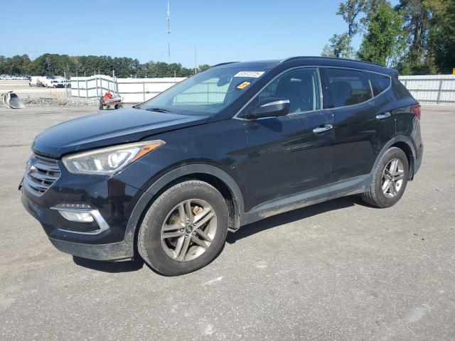 HYUNDAI SANTA FE S 2018 with VIN 5NMZU3LBXJH065336 - Photo from auction