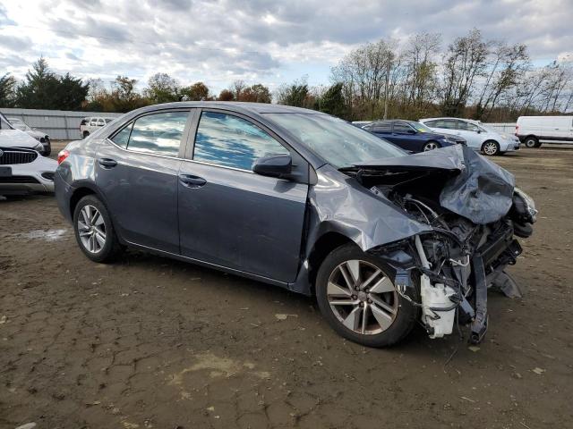Photo 4 from auction – 2014 TOYOTA COROLLA EC with VIN 2T1BPRHE0EC136909