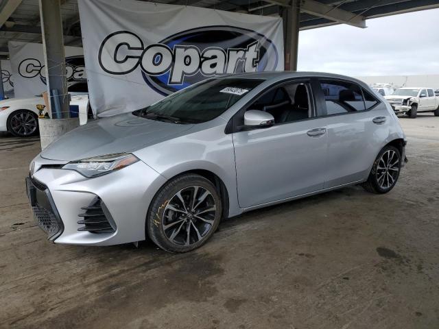 TOYOTA COROLLA L 2018 with VIN 2T1BURHE4JC064809 - Photo from auction