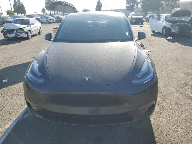 Photo 5 from auction – 2025 TESLA MODEL Y with VIN 7SAYGDED8SF317193