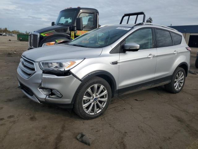 FORD ESCAPE TIT 2018 with VIN 1FMCU9J92JUC69268 - Photo from auction