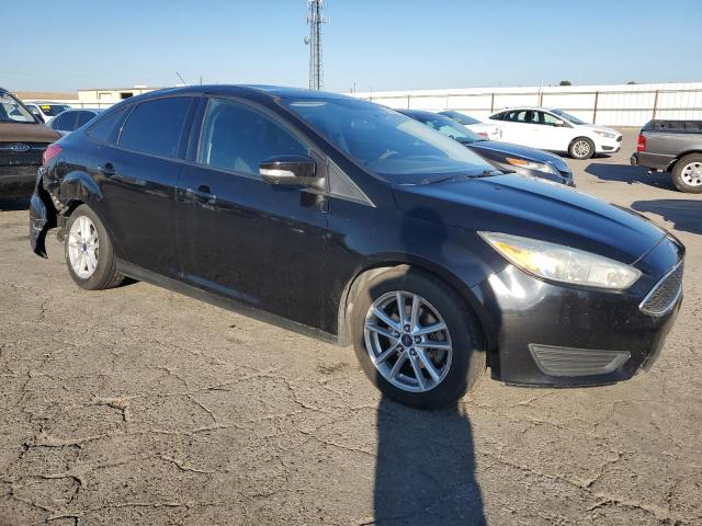 Photo 4 from auction – 2016 FORD FOCUS SE with VIN 1FADP3F29GL383829