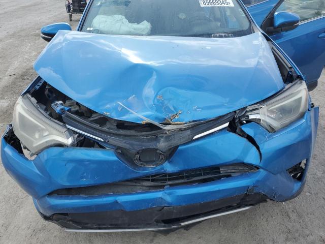 Photo 12 from auction – 2018 TOYOTA RAV4 with VIN JTMRFREV9JJ258656