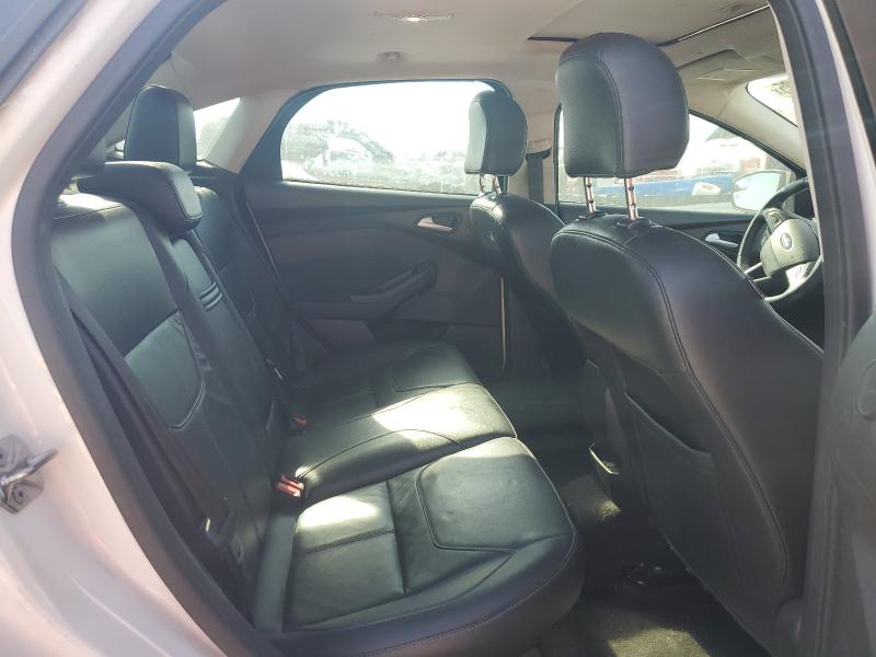 Foto 10 de la subasta – 2016 FORD FOCUS TITA con VIN 1FADP3J22GL406830